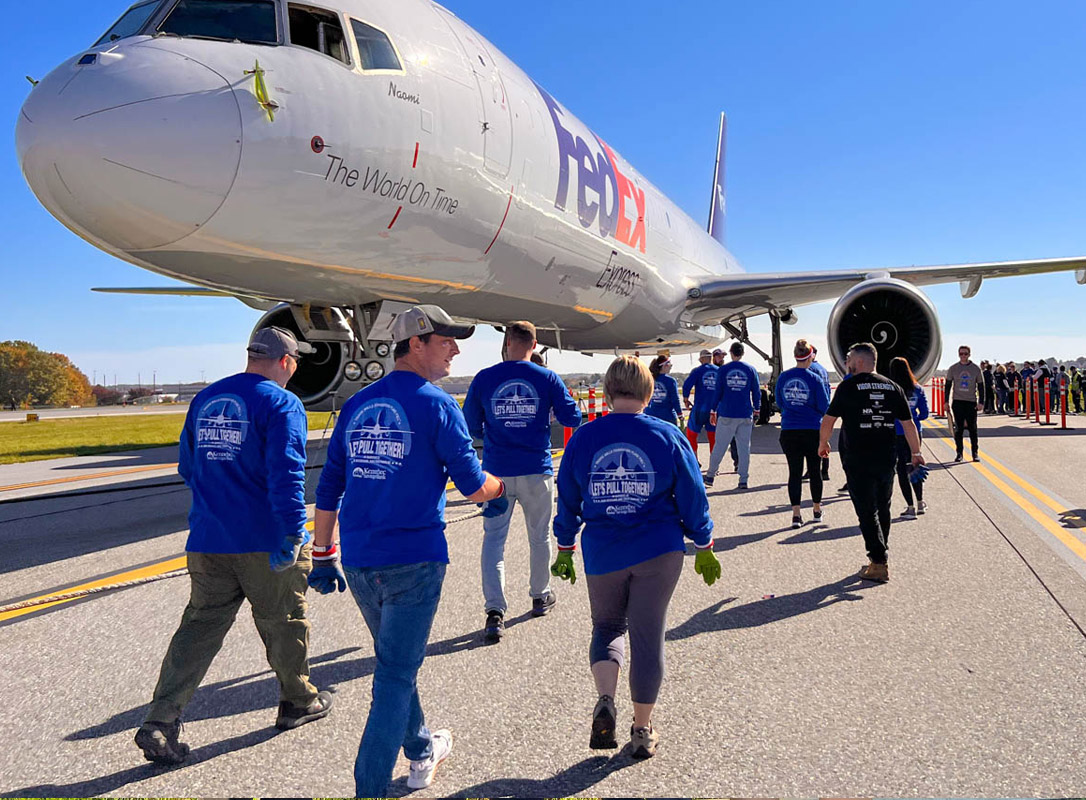 KSB Team Members participate at the Travis Mills Plane Pull 