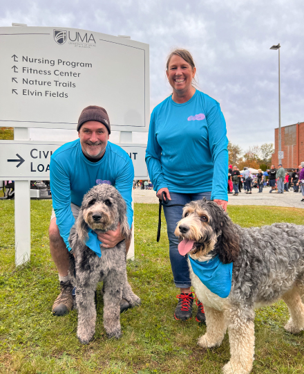 KSB team members pose for a photo with their dogs