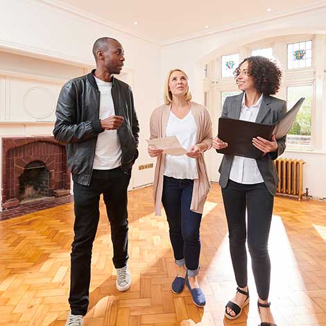 Couple looking at new house.