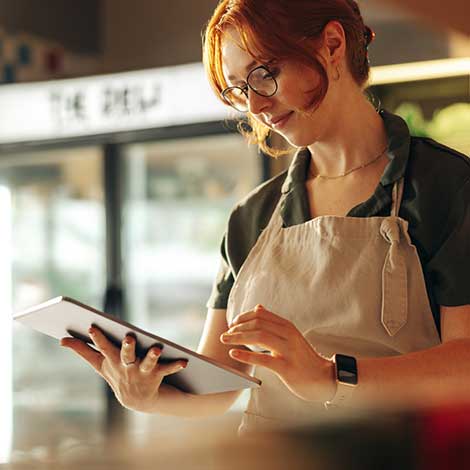 Businesswoman using tablet.