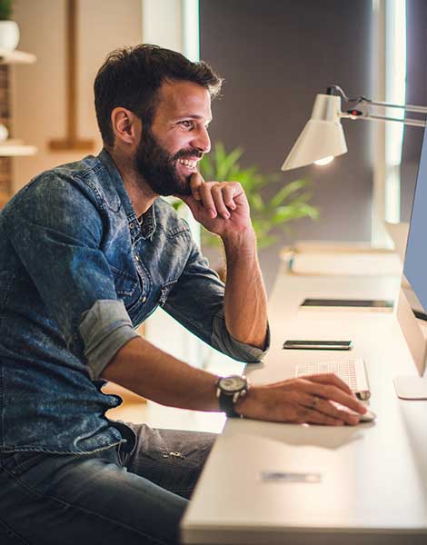 Man working at computer.